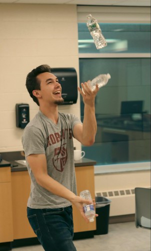Dylan Geer juggles water bottles