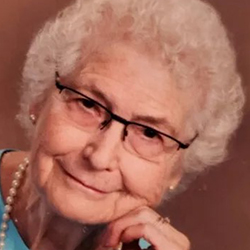 Faith Wledon smiles slighlty