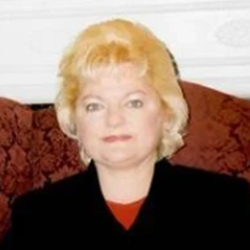 LuAnn L. (Olien) Kachelein smiles