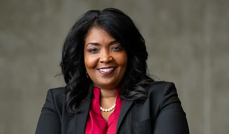 A professional woman smiles