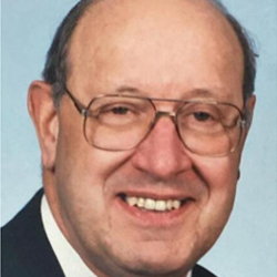 William (Bill) J. Reining smiles