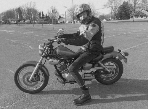 Alexander rides a motorcycle