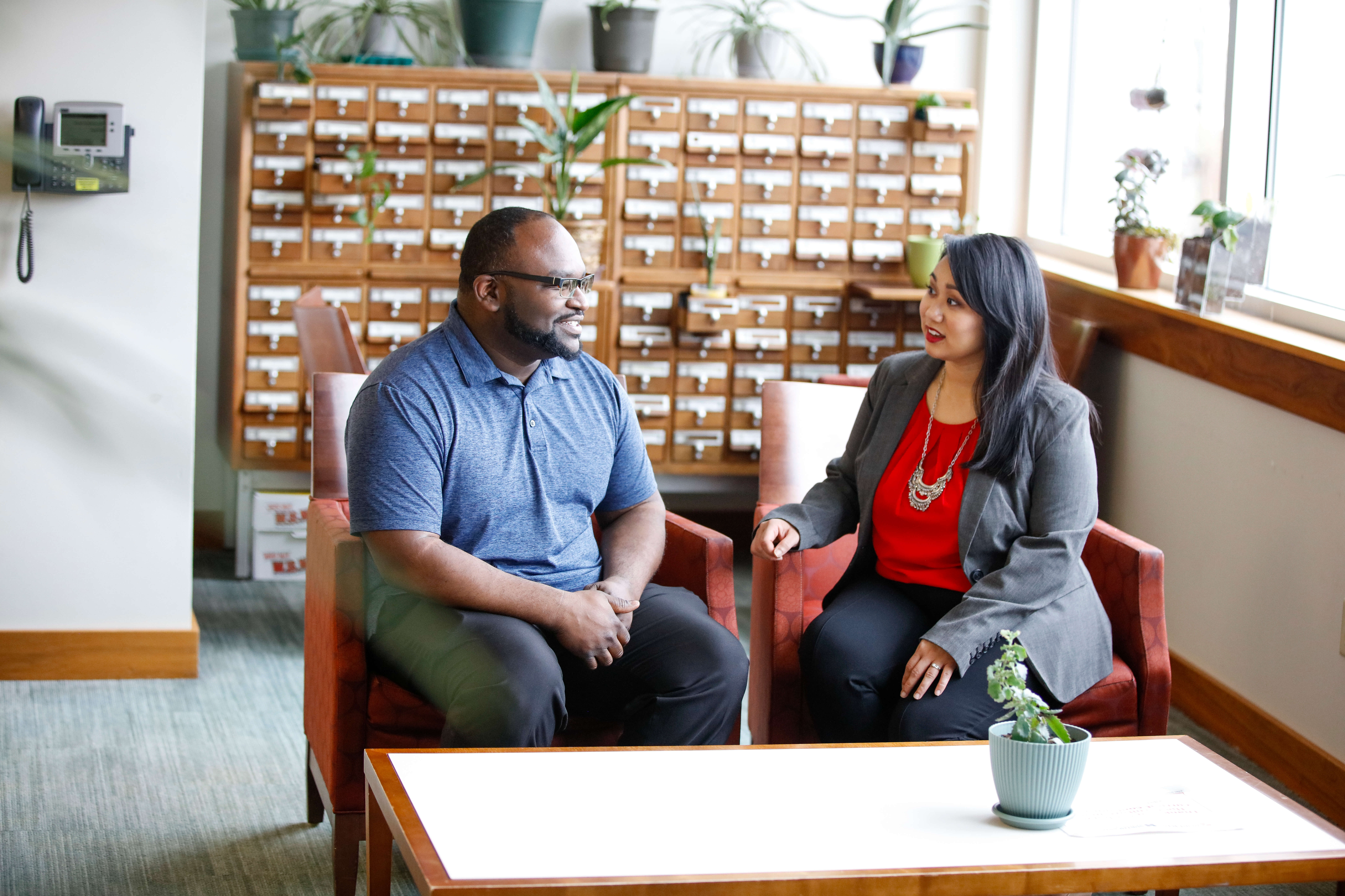 Two diverse students talking