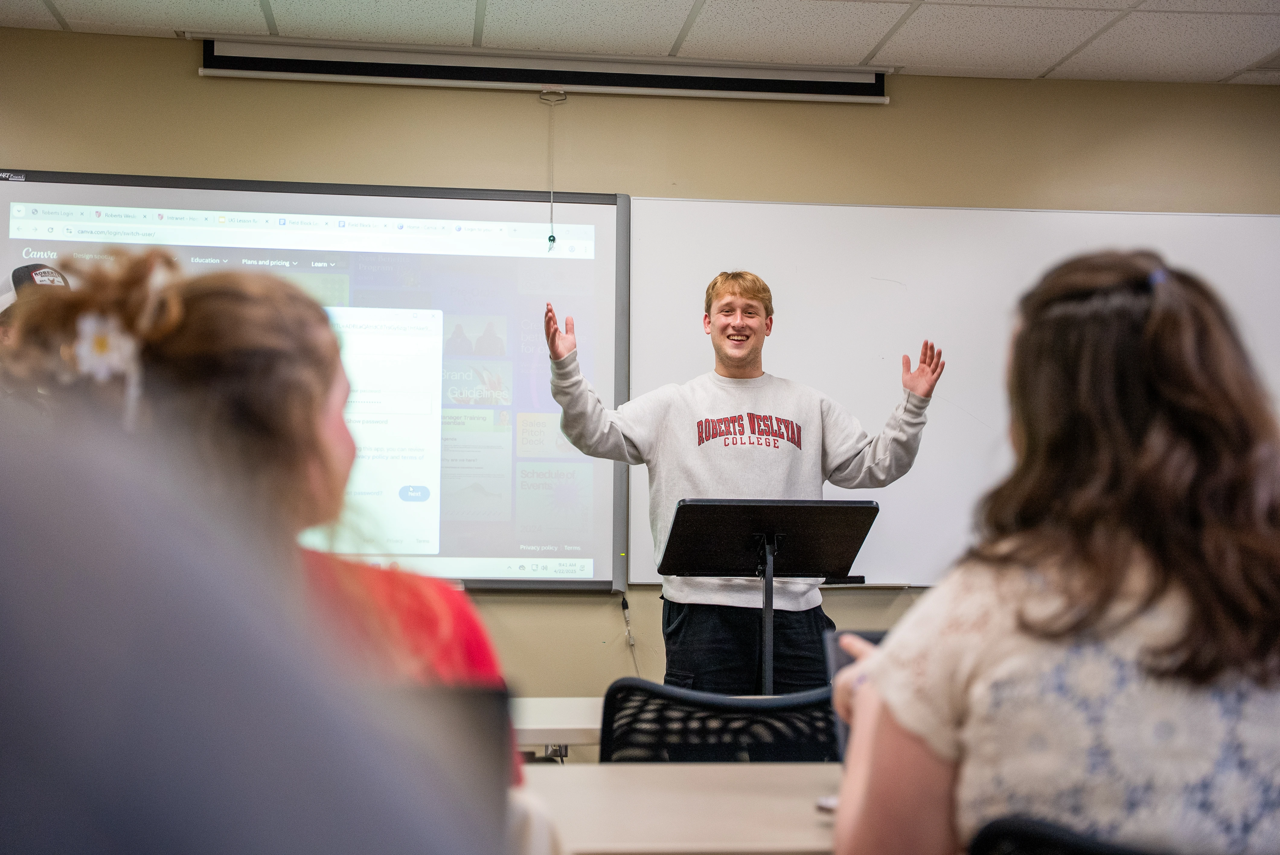 A Male Teacher Education Student Giving A Presentation